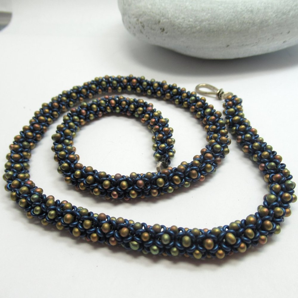 Handstitched drop and Demi round necklace